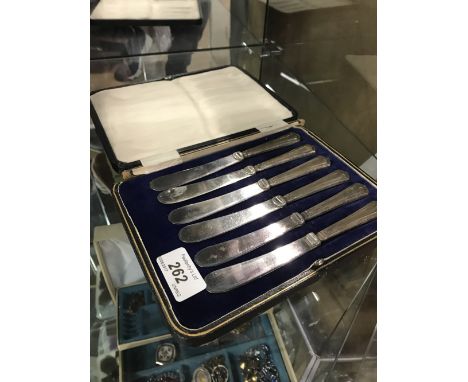 SET OF 6 SILVER HANDLED BUTTER KNIVES