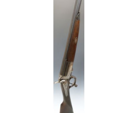 Henry Dowling of Dublin 20 bore single barreled shotgun with named and engraved locks, chequered semi-pistol grip and forend,