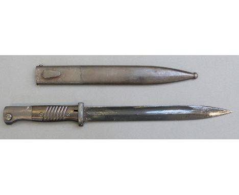 WWII German MK98 bayonet with plastic grip, marked to blade s/155G-5904 and 42cof/3744 to scabbard, blade length 25cm