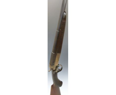 John Dixon & Son of Edinburgh .410 single barreled shotgun with engraved locks, chequered semi-pistol grip and horn tipped fo