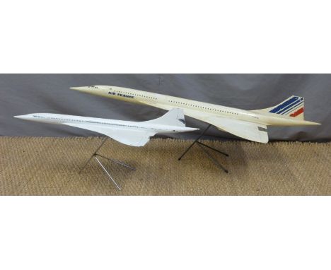 Two large scale Concorde models on stands, possibly ex shop/travel agent display, longest 122cm