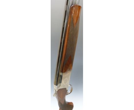 Winchester 5000 Field 12 bore over and under shotgun with engraved locks and trigger guard, single selective trigger, chequer