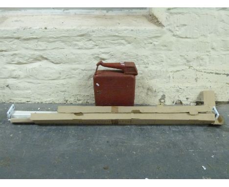 A vintage Eversure petrol can, Travall dog guard for an Audi A4 estate car or similar with fittings, in unopened  shrink wrap