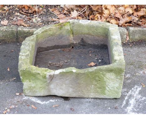 A D shaped carved natural stone trough (W67 x D69 x H22cm)
