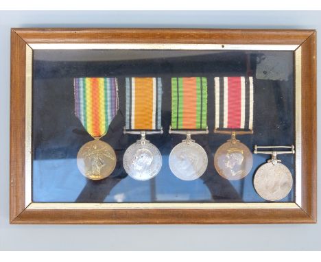 A set of four mounted medals comprising WWI Victory medal named to 287436 H Barton Army Service Corps, WWI war medal and WWII