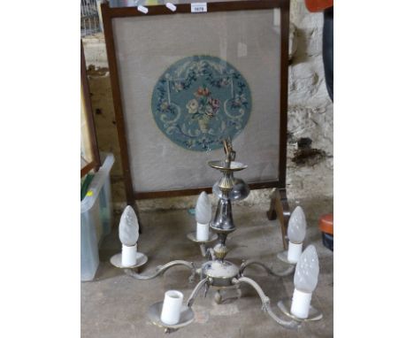 A fire screen and a chandelier