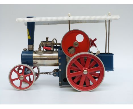 Wilesco Old Smokey live steam traction engine with solid fuel burner, slip eccentric reversing, chain steering and whistle