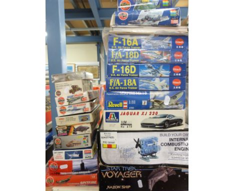 Twenty-two Airfix, Matchbox, Italeri and similar model kits including Build Your Own Internal Combustion Engine, Star Trek Vo