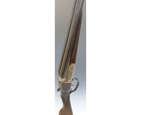 Charles Smith & Sons of Newark 12 bore side by side ejector shotgun with named and engraved locks, chequered grip and forend,