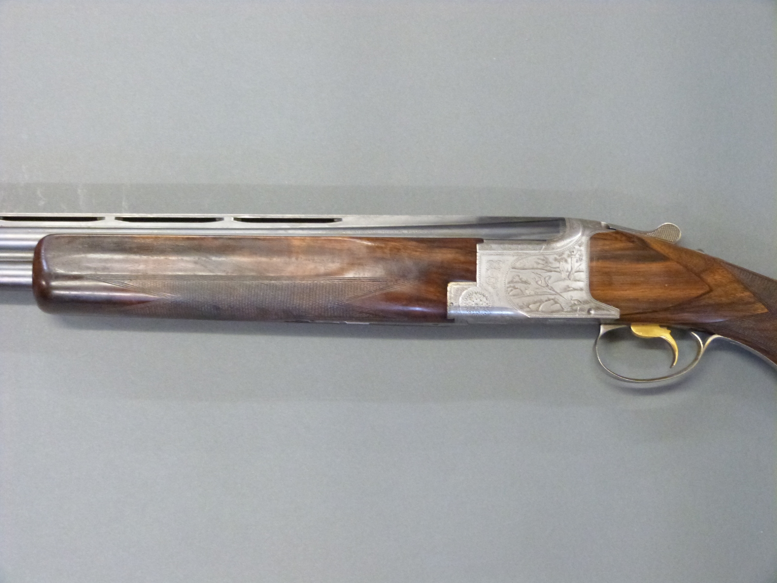 Browning B2 12 bore over and under shotgun with engraved scenes of ...