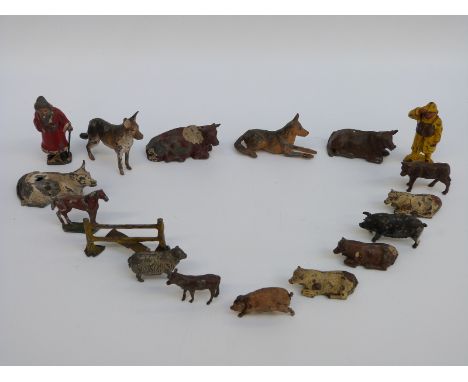 Seventeen Britains and similar lead farm animals and figures including two John Hill & Co Johillco lead figures Father Christ