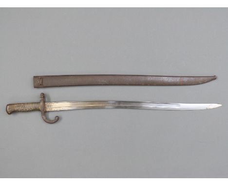 A 19thC 1866 pattern French Yataghan Chassepot bayonet marked St Etienne Mai 1871 to blade and E77718 to hilt, overall length