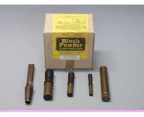 Three brass cartridge tapers with turned wooden handles together with a Lee Enfield brass oil bottle stamped H.J&S above mini
