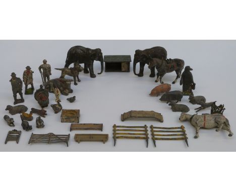 Over 30 Britains and similar lead model animals including elephants, penguins etc, some larger scale