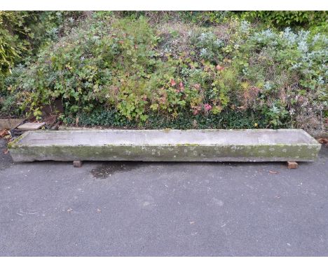 A particularly long carved natural stone trough (L366 x W48 x H23cm)