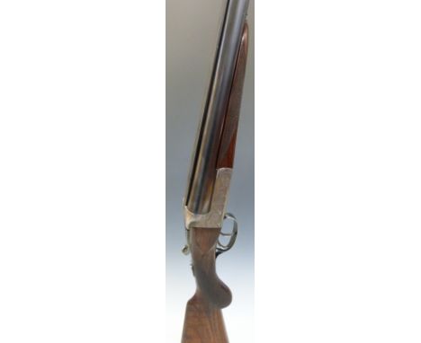 Thomas Wild 12 bore side by side ejector shotgun with named and engraved locks, chequered semi-pistol grip and forend, double