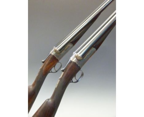 Pair of Westley Richards 12 bore 'Gold Name' side by side boxlock ejector shotgun with hand detachable locks, chequered grips