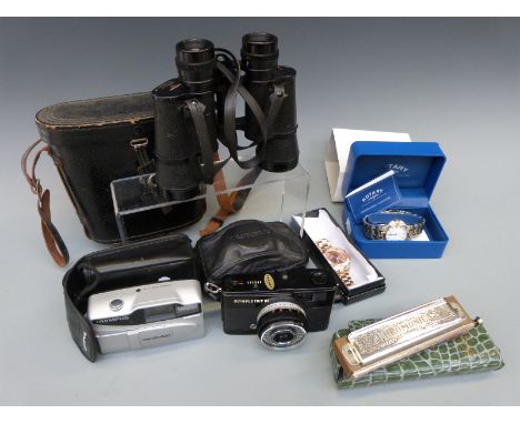 A cased pair of Swift binoculars, Olympus Trip XB400 and 35 cameras, Hohner Chromatic harmonica in G and two modern gentleman