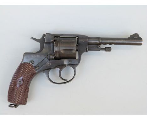 Deactivated Russian Nagant 7.62mm seven shot double action revolver with moulded grips, single suspension loop and 4.5 inch b