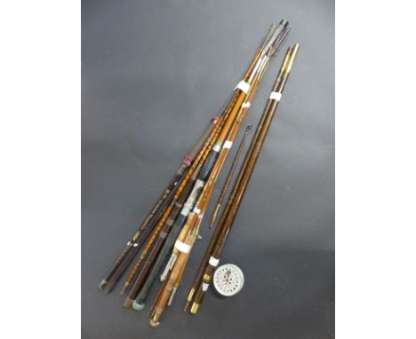 A collection of split cane, largely coarse fishing rods together with a Scottish hand putter/Sunday stick and a cane rod rest