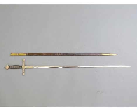 A dress or ceremonial sword inscribed to blade Fab de Toledo and numbered 5725 to guard, with hardwood wired handle and brass