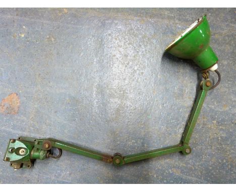 A vintage E.D.L or similar green enamel anglepoise type machinists lamp