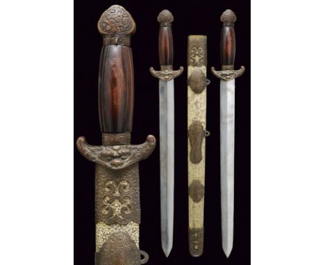 dating: circa 1900 provenance: China, Straight, double-edged blades, ribbed in the center. Brass hilts with quillon, decorate