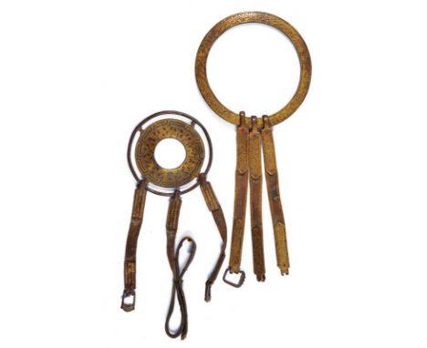 dating: 17th Century provenance: Tibet, The first with a big, iron circle, richly engraved, pierced and gilded with floral mo