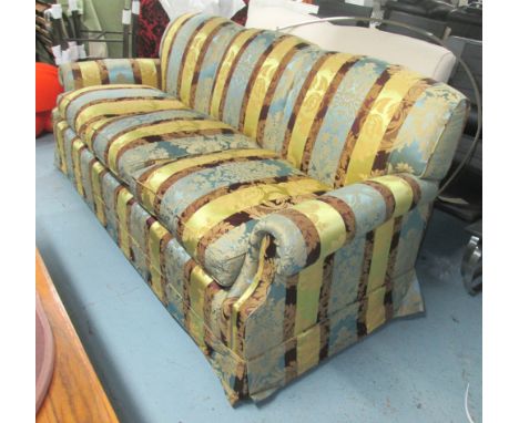 PETER DUDGEON SOFA, three seater, with brown and blue and gold striped and foliate patterned upholstery, 229cm L x 90cm H. (w