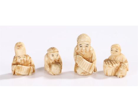 Collection of early 20th Century Japanese ivory netsuke, of a seated figure with basket, a sage, another and a figure with a 