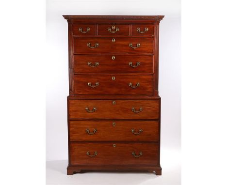George III mahogany chest on chest, the dental cornice above three short drawers and six long graduated drawers on bracket fe
