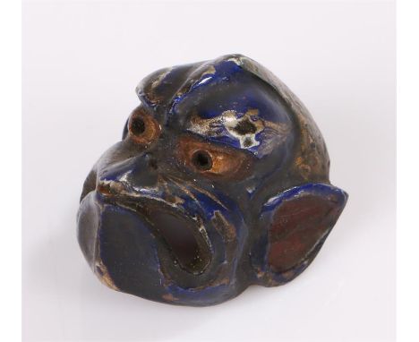 Japanese Meiji period netsuke, the lacquered wood netsuke carved as a mask of cappa, indistinct signature 2cm high