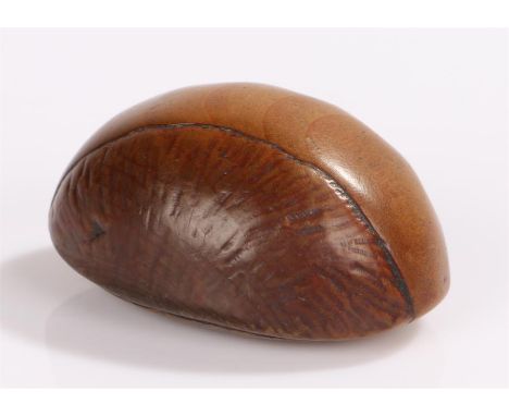 Japanese Meiji period carved netsuke, of half a nut, 4.3cm wide