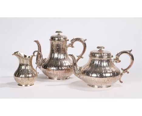 Silver plated teapot, coffee pot and milk jug, with acanthus leaf capped handles, the bodies with engraved decoration and cre