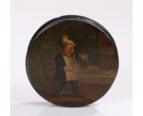 19th century papier mache circular snuff box and cover, the lid with depiction of a portly gentleman carving a suckling pig, 