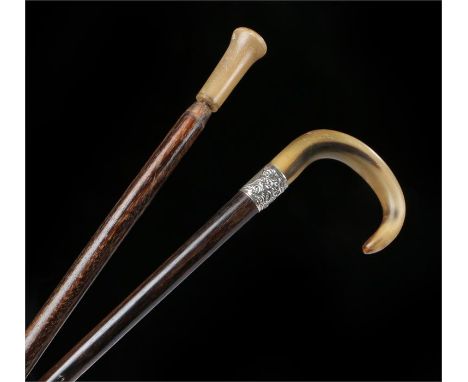 Two sticks to include a 19th Century horn handled walking cane, the handle possibly rhinoceros horn, together with another ho