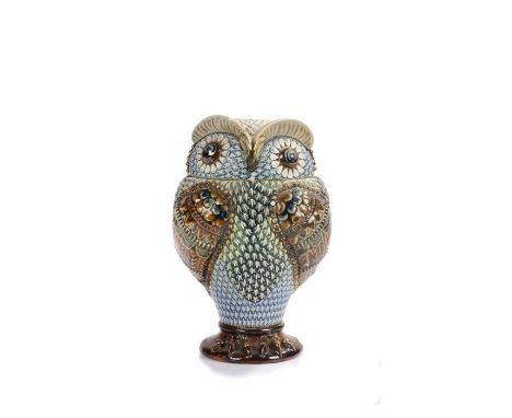 Doulton Lambeth stoneware owl tobacco jar and cover, the cover with blue button eyes with high green brows, it's green, brown