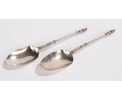Pair of Victorian silver apostle spoons, Sheffield 1884, maker Henry Wilkinson & Co, the apostle form finials above twisted s