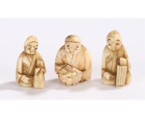 Collection of Japanese ivory netsuke, to include three seated figures each in a different position, (3)