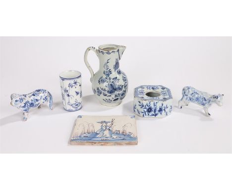 Collection of five Delft wares, a jug with foliate decoration, an inkwell with makers mark to base, a rectangular tile decora