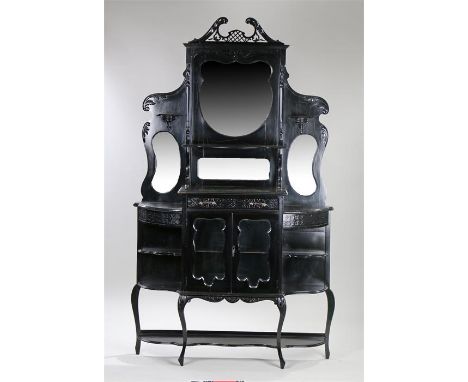 Edwardian ebonised display cabinet, pierced scrolled pediment, bevelled mirror inset top  with central shelf and drawer, the 