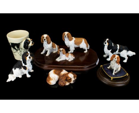 A Collection of King Charles Dog Figures (5) in total. Comprising Scottish Fraser Creations King Charles Family Ruby/White R1