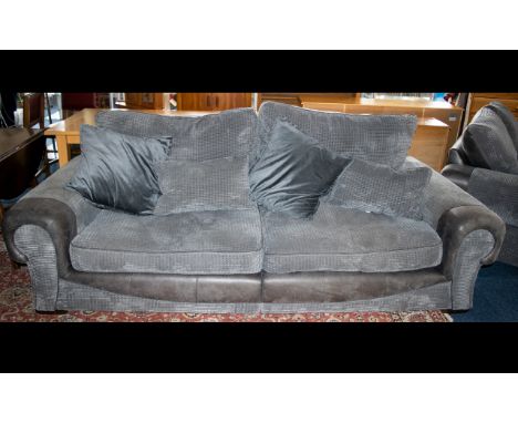 A Very Large Contemporary Three Seater Sofa Complete with matching scatter cushions, very large sofa with plush slate grey te