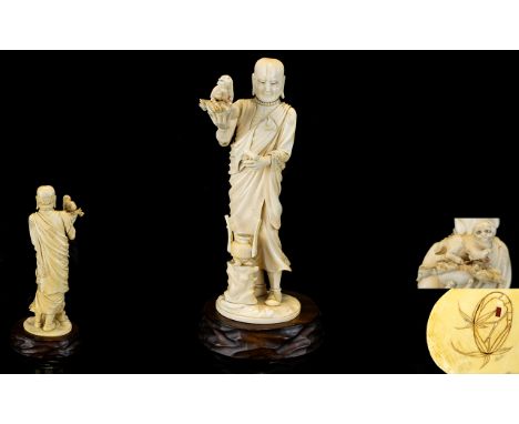 Japanese Tokyo School - Signed Meiji Period 1864 - 1912 Finely Carved Ivory Okimono of a Priest Dressed In Flowing Robes, Hol