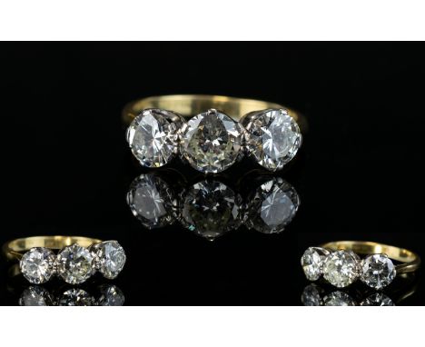 Art Deco Period 18ct Gold and Platinum 3 Stone Diamond Set Dress Ring of Wonderful Quality. The ( 3 ) Old Brilliant Cut Diamo