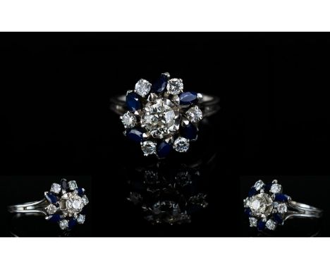 18ct White Gold Diamond and Sapphire Dress Ring, In a Flower head Design Setting. The Diamonds and Sapphires of Good Colour /