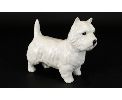 A Beswick West Highland Terrier Figurine White ceramic figure, in very good condition, 5 inches in length. Also a Royal Doult