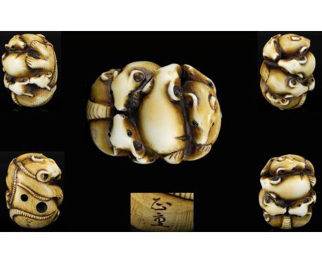 A 19th Century Finely Carved Netsuke In The Form Of A Nestling Family of Rats Intricately carved Netsuke depicting Mother rat
