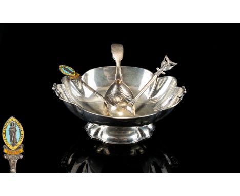 Three Silver Teaspoons And Silver Footed Dish Four items in total to include silver oval bon bon dish with fluted edge, small