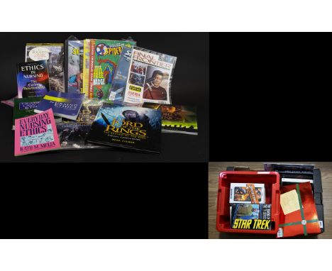 A Collection of Star Trek And Lord Of The Rings Related Books To include Star Trek the undiscovered country magazine, The fel